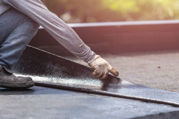 Professional Basement Waterproofing technician working in Westminster, MD